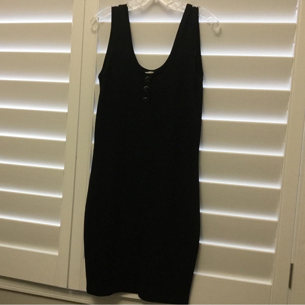 ST John black net dress.